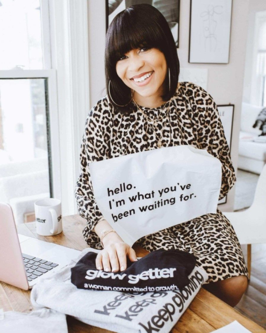 a woman holding a custom package